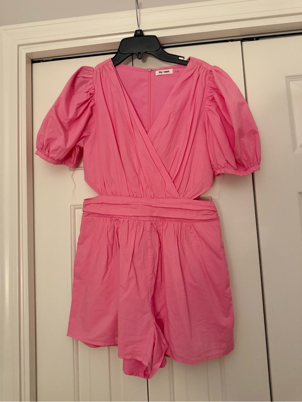 DO+BE Pink Puff Sleeve Romper with cut outs on the side!